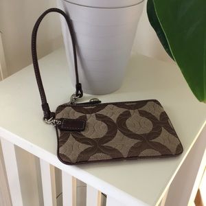 Brown tone coach signature wristlet!